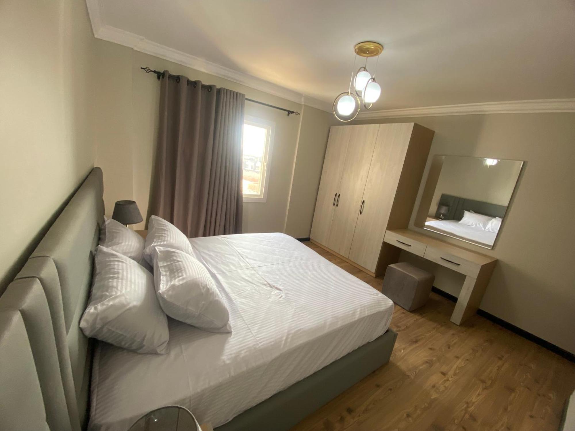 Appartement فندقية اكسترا هاي مودرن للايجار المفروش علي اعلي مستوي كومباوند اوشن بلو شيراتون المطار